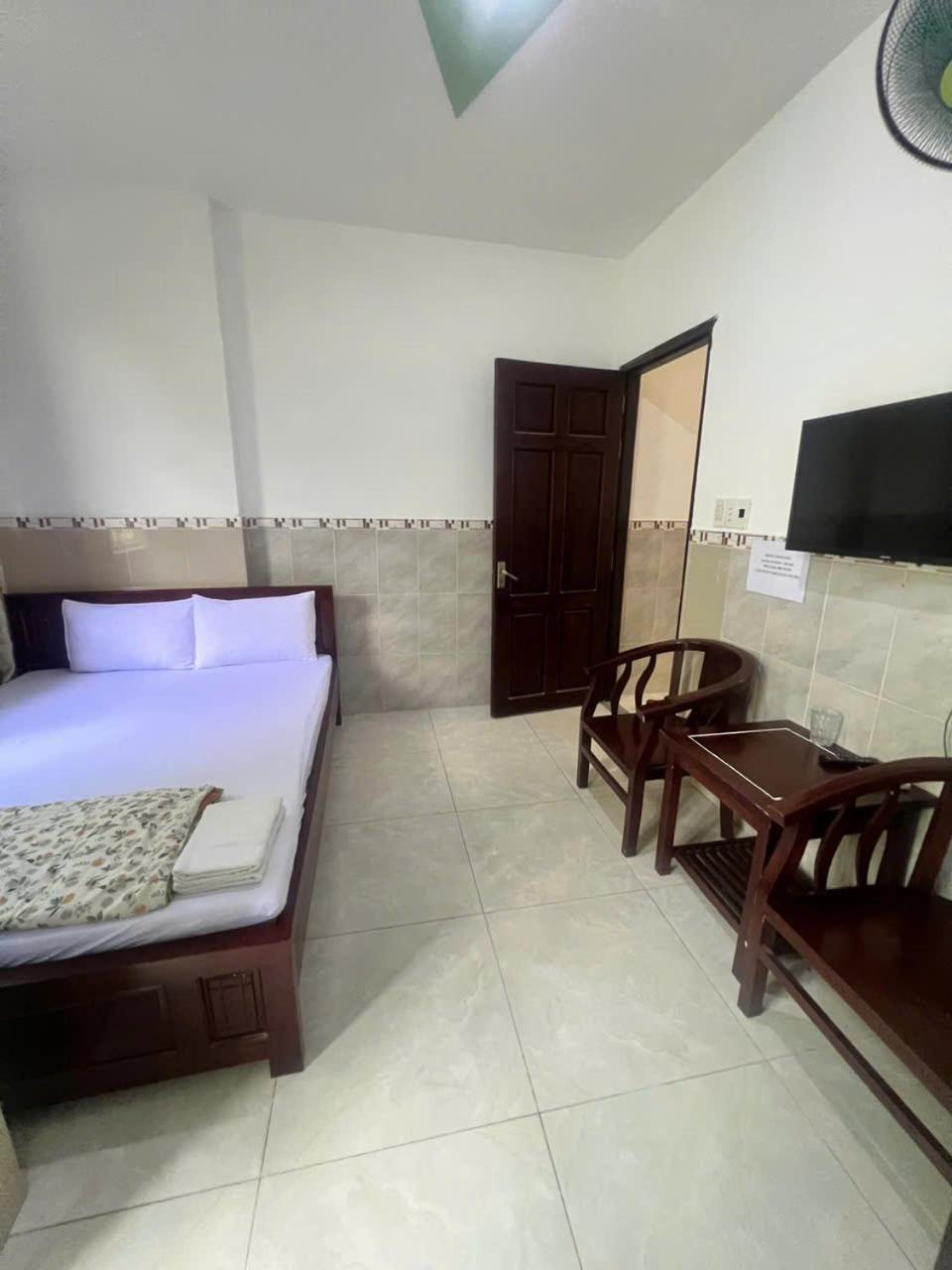 Aparthotel Khach San Doan Gia Thành Pho Ho Chí Minh Esterno foto